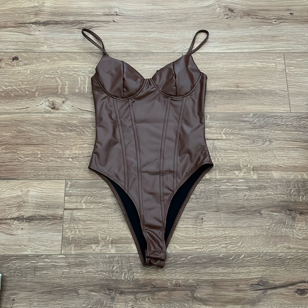 Leather bodysuit!